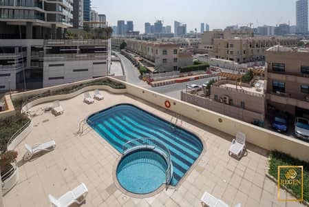 2 habitaciones Apartamento para en Venta en Jumeirah Village Circle (JVC), Dubai - Al Dana jvc pool. jpg