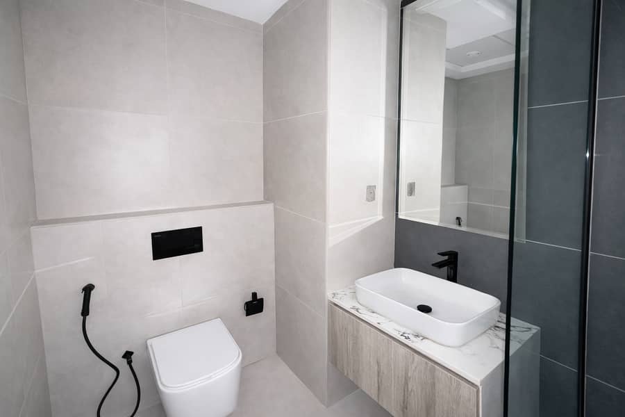 5 Modern gray bathroom with clean lines. png