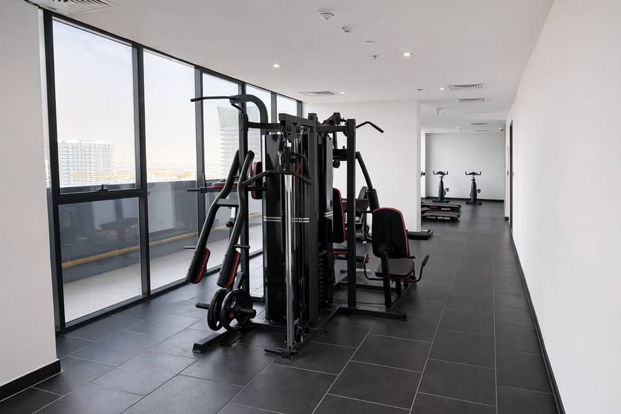 10 Modern fitness center with urban view. png