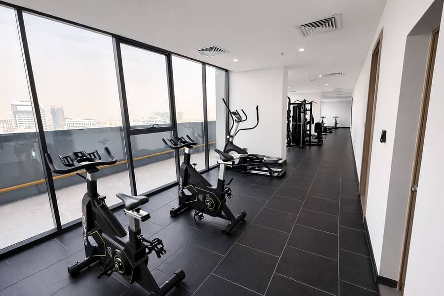 11 Modern gym with city view (1). png