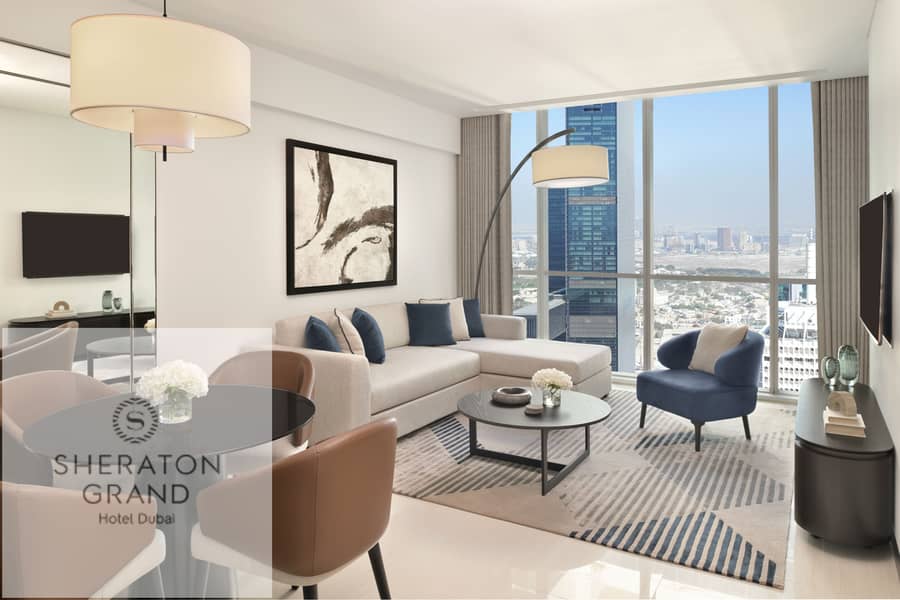 5 One-Bedroom Apartment - Living + Dining. JPG