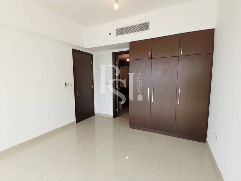 5 1-bedroom-abu-dhabi-al-reem-marina-square-marina-blue-built-in-closet. jpg