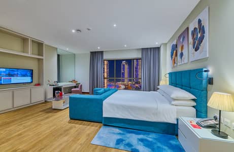 شقة فندقية 1 غرفة نوم للايجار في جميرا بيتش ريزيدنس، دبي - Deluxe Room City View (King). jpg