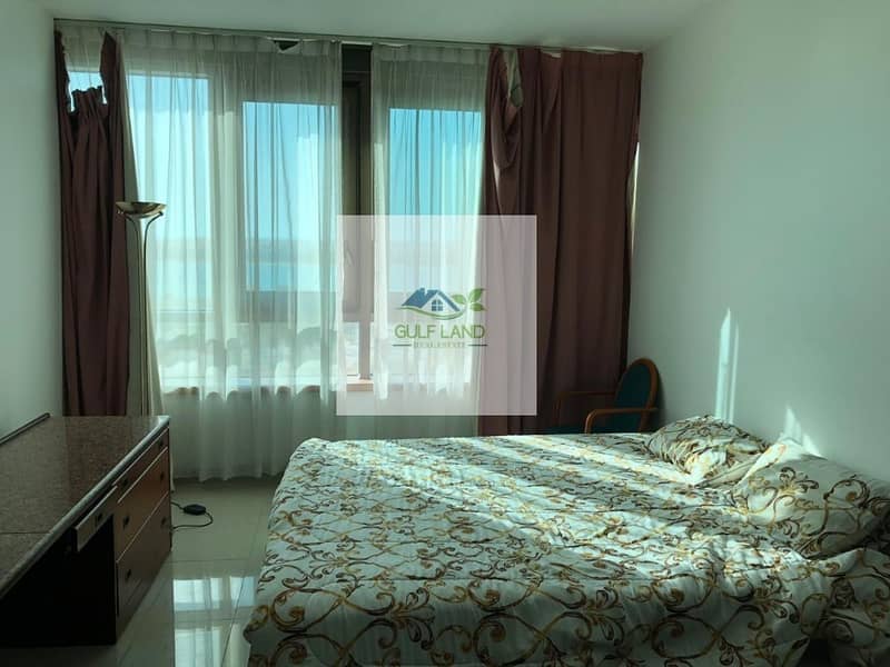 studio with furniture include electric and water sea view