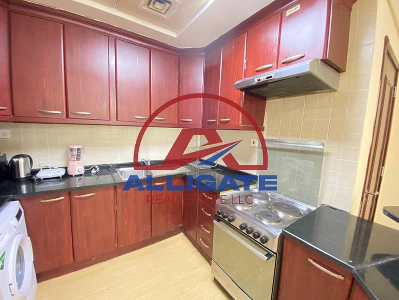 16 Kitchen with fitted cooker. jpg