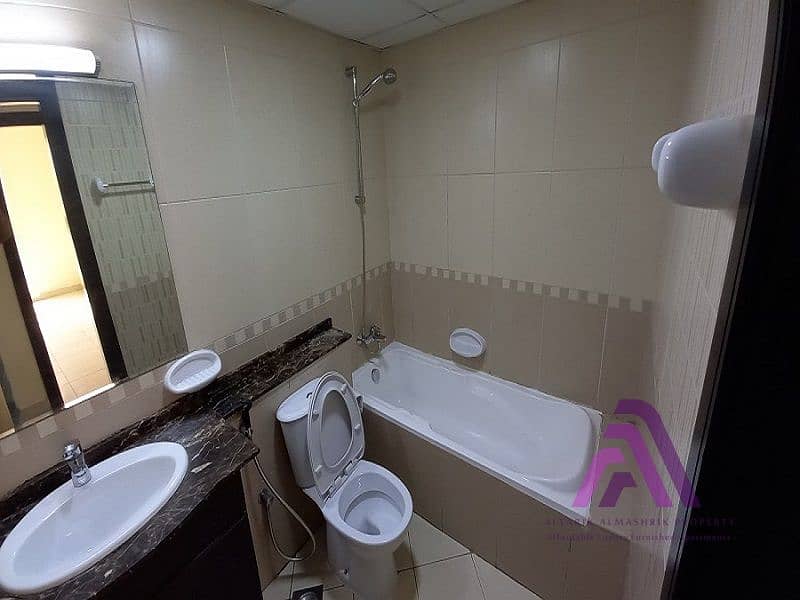 1 Bedroom Apartment | Prime Residence 1 | Balcony & Community View | International City - Image 9