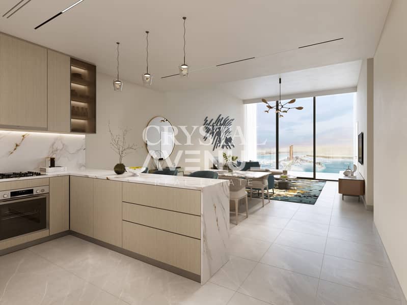 2 Al Hamra - Waterfront - Interior - 2BD Living Dining Kitchen. jpg