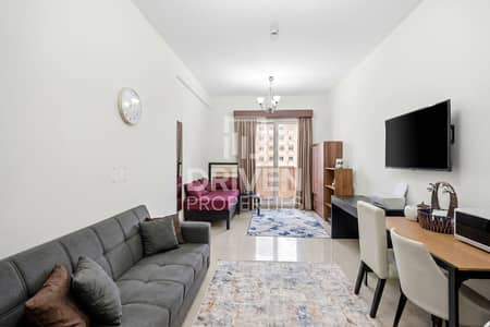 Studio for Sale in Jumeirah Village Circle (JVC), Dubai - Chiller Free | Rented | Pool View | Furnished Studio for Sale in Jumeirah Village Circle (JVC), Dubai - Chiller Free | Rented | Pool View | Furnished