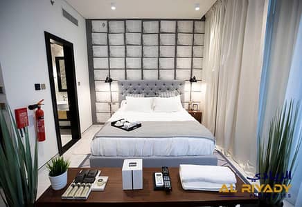 شقة فندقية  للايجار في الخليج التجاري، دبي - RcO8ZYS5-Millennium-Atria-Business-Bay. jpeg
