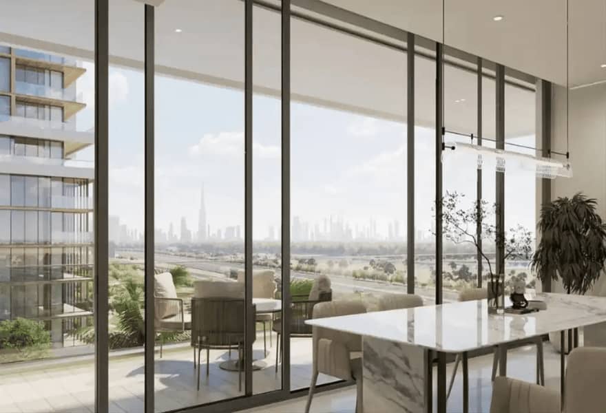 7 Sobha One balcony dining area with Downtown Dubai skyline and creek views