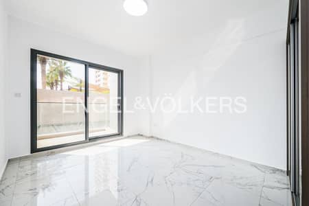 2 Bedroom Apartment for Rent in Jumeirah Village Circle (JVC), Dubai - Low Floor | Unfurnished | Pool View 2 Bedroom Apartment for Rent in Jumeirah Village Circle (JVC), Dubai - Low Floor | Unfurnished | Pool View