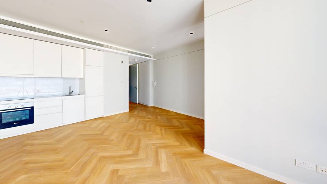 5 08NT-1BHK-06-T1-Living-Room. jpg