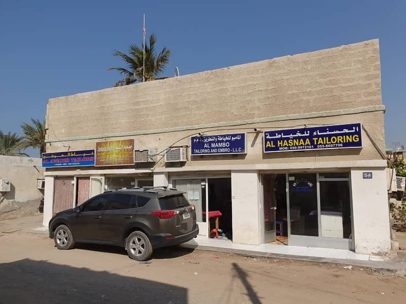GOLDEN CHANCE FOR PROFITABL INVESTMENT!!! 2000 SQF  LAND WITH 4 SHOP AND 4 BHK ARABIC HOUSE FOR SALE IN RASHEDIA -3