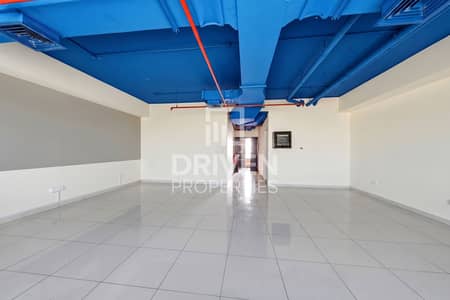 Office for Rent in Dubai Silicon Oasis (DSO), Dubai - Industrial Modern Ceiling | Close to Bus Stop