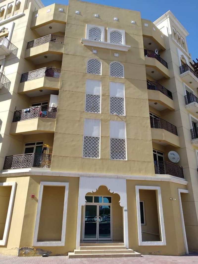 Emirates Cluster Bright and Specious One bedroom with Balcony close to bus Stop Rent 29k by 4 cheqs