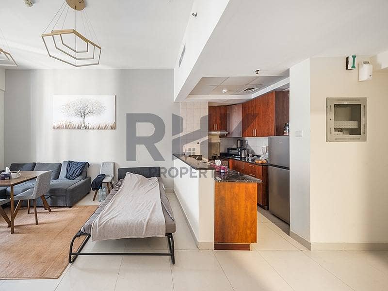 9 Open-plan living and kitchen area in furnished Dubai Marina apartment