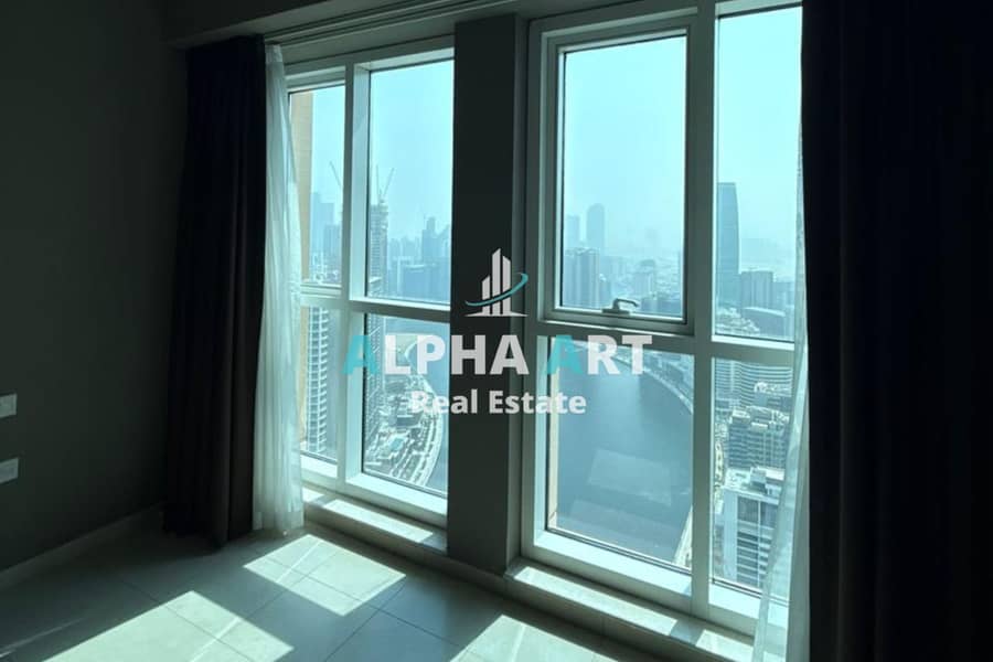 2BR Apartment | Burj & Canal Views | Balcony | Churchill Residence - Image 8