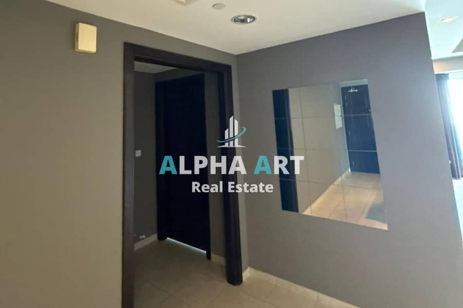 2BR Apartment | Burj & Canal Views | Balcony | Churchill Residence - Image 10