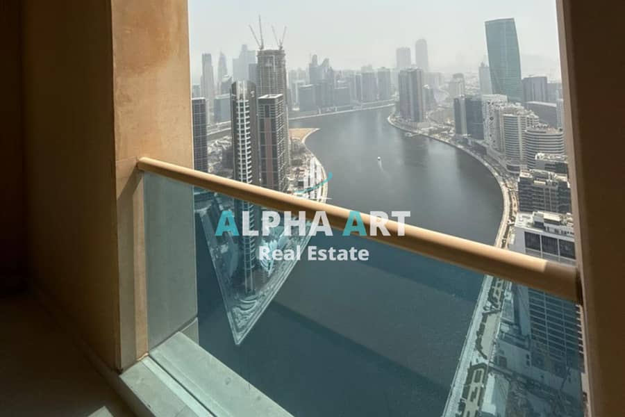 2BR Apartment | Burj & Canal Views | Balcony | Churchill Residence - Image 12