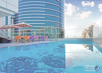 شقة فندقية 1 غرفة نوم للايجار في برشا هايتس (تيكوم)، دبي - PremierInnDubaiBarshaHeights_SwimmingPool. jpg