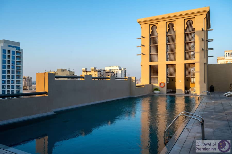 7 Premier Inn Dubai Al Jaddaf Swimming Pool. jpg