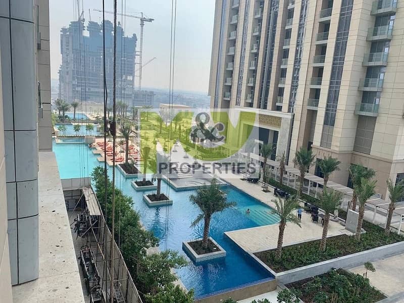 Canal and pool view spacious 1 Br