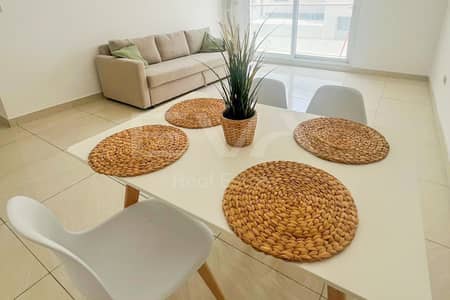 1 Bedroom Apartment for Rent in Jumeirah Village Circle (JVC), Dubai - COMMUNITY VIEW | FURNISHED | UP TO 4 CHEQUES