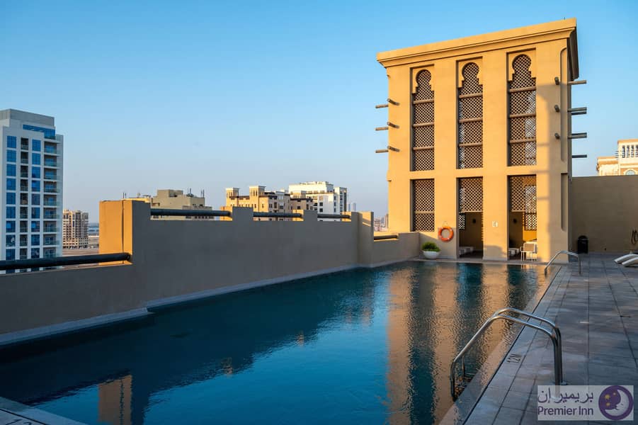 7 Premier Inn Dubai Al Jaddaf Swimming Pool. jpg