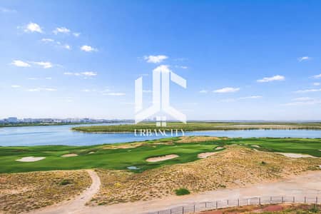 Studio for Sale in Yas Island, Abu Dhabi - Serene waterfront golf course view. png