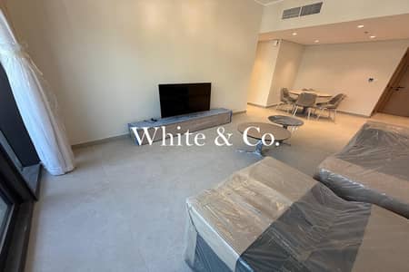 2 Bedroom Apartment for Rent in Jumeirah Village Circle (JVC), Dubai - Brand New | Furnished | Near Mall + Exit