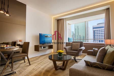 3 Bedroom Flat for Rent in Sheikh Zayed Road, Dubai - One Bedroom Apartment Living Room. jpg