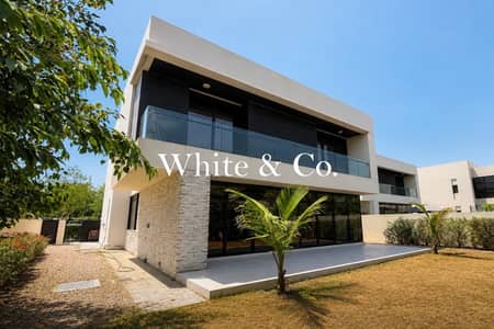 5 Bedroom Villa for Rent in DAMAC Hills, Dubai - Large Garden | Unfurnished | Opposite Pool