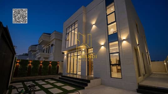 4 Bedroom Villa for Sale in Al Helio, Ajman - Luxury_villa_nighttime_scene_202605270212. jpeg 4 Bedroom Villa for Sale in Al Helio, Ajman - Luxury_villa_nighttime_scene_202605270212. jpeg