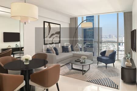 1 Спальня Апартаменты в отеле в аренду в Шейх Зайед Роуд, Дубай - One-Bedroom Apartment - Living + Dining. JPG