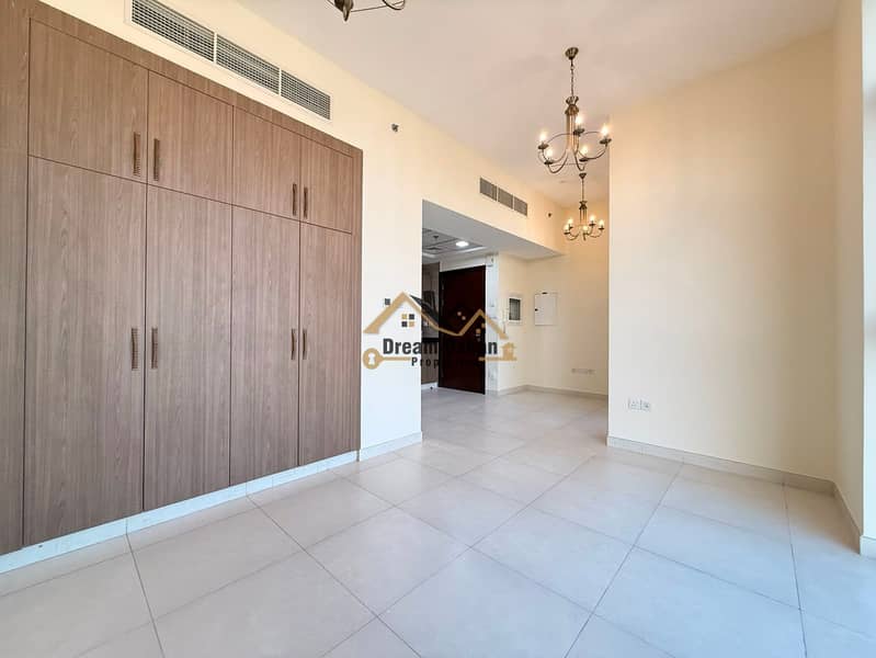 Studio with Balcony 42K Yearly 4cheqs Gym Pool Parking