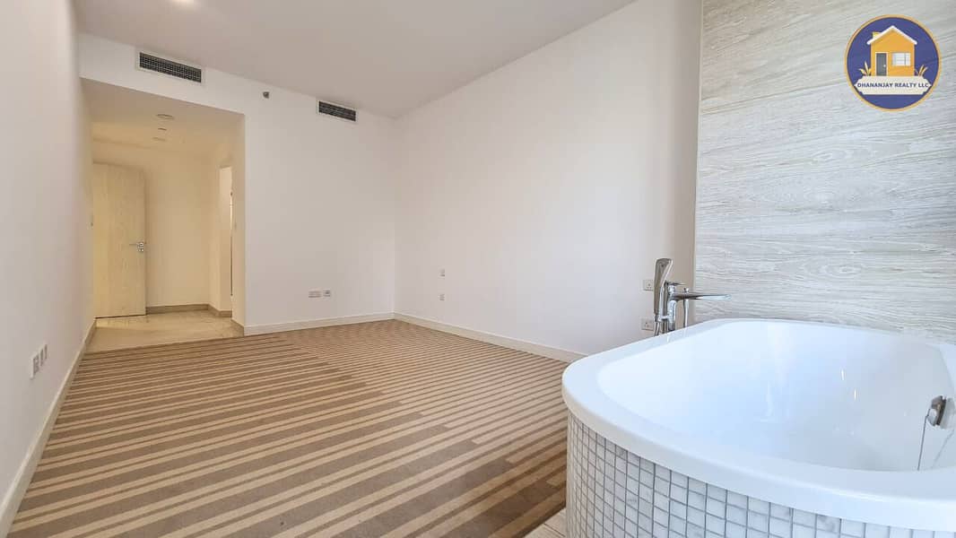 23 luxury 2 bedroom apartment with maid's room for sale in MBR City. jpg