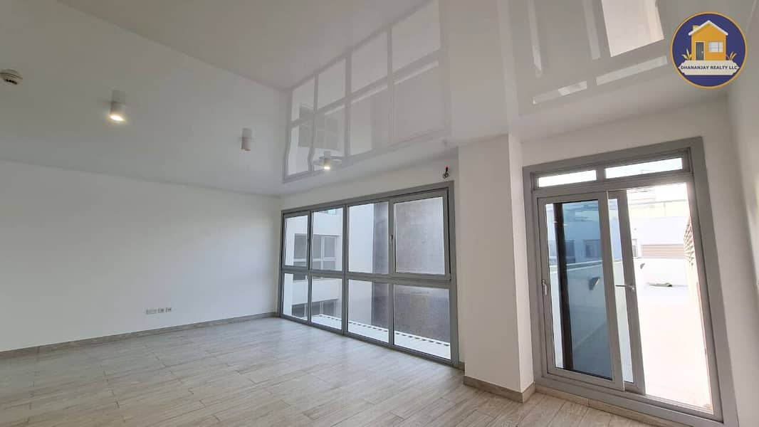 26 massive 2 bedroom apartment with maid's room at Grenland Residence in MBR City. jpg