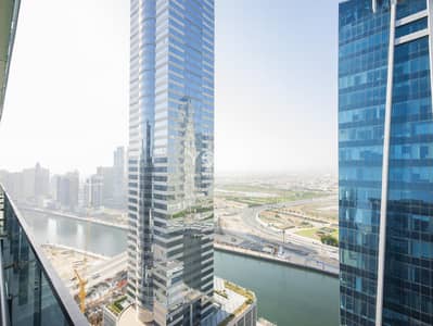 2 Bedroom Apartment for Rent in Business Bay, Dubai - Canal View | Kitchen Equipped | 3 Balconies