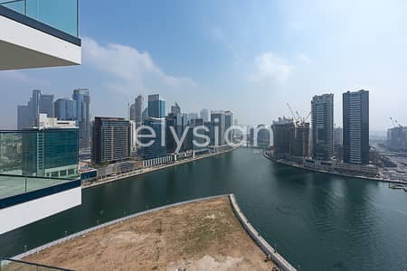 1 Bedroom Flat for Rent in Business Bay, Dubai - Brand New | High-Floor Unit | Stunning Canal View