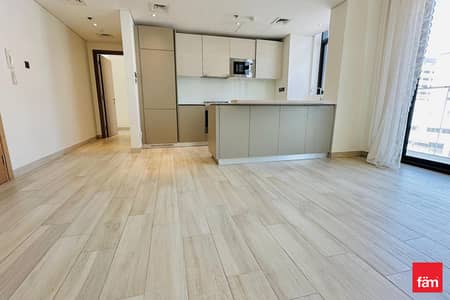 1 Bedroom Flat for Rent in Jumeirah Village Circle (JVC), Dubai - Chiller Free Building Vacant Fitted Kitchen
