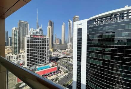 شقة 2 غرفة نوم للايجار في الخليج التجاري، دبي - شقة في برج كورال،الخليج التجاري 2 غرف 135000 درهم - 15307976