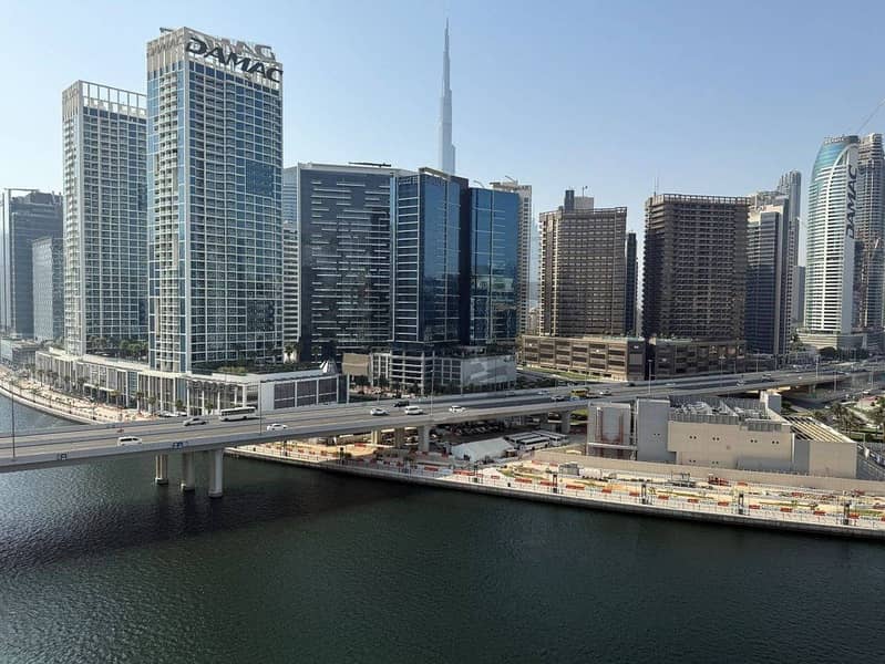 Full Canal and Burj Khalifa Views | Upgraded | Appliances Included Full Canal and Burj Khalifa Views | Upgraded | Appliances Included