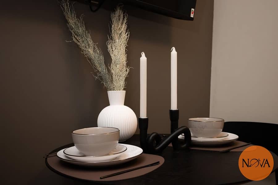 Stylish and fully furnished | 5 Min to Metro | Prime Waterfront Location | Vacant since July - Image 2