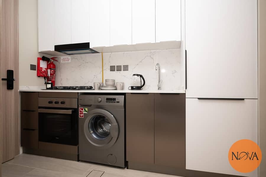 Stylish and fully furnished | 5 Min to Metro | Prime Waterfront Location | Vacant since July - Image 11