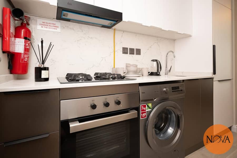 Stylish and fully furnished | 5 Min to Metro | Prime Waterfront Location | Vacant since July - Image 12