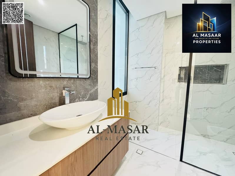 Villa in Al Zorah, Ajman, fully smart, with private pool, electricity, water, and air conditioning included. Freehold ownership for all nationalities. - Image 31