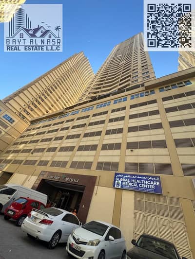 2 Bedroom Apartment for Sale in Emirates City, Ajman - Lilies Tower Cover Pic. jpg 2 Bedroom Apartment for Sale in Emirates City, Ajman - Lilies Tower Cover Pic. jpg