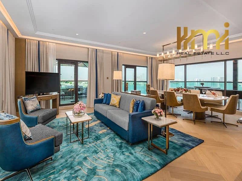 3 Taj-Exotica-The-Palm_Exotica-Suite-Sea-View_Living-and-Dining-Area. jpg