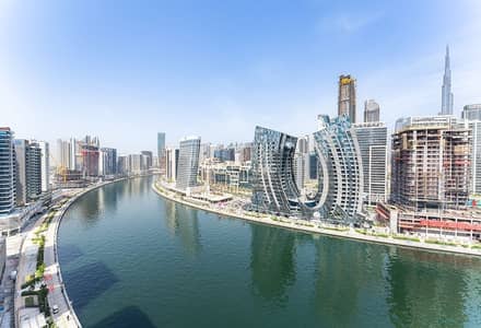 2 Bedroom Flat for Rent in Business Bay, Dubai - Furnished | Burj and Canal View | Mid Floor