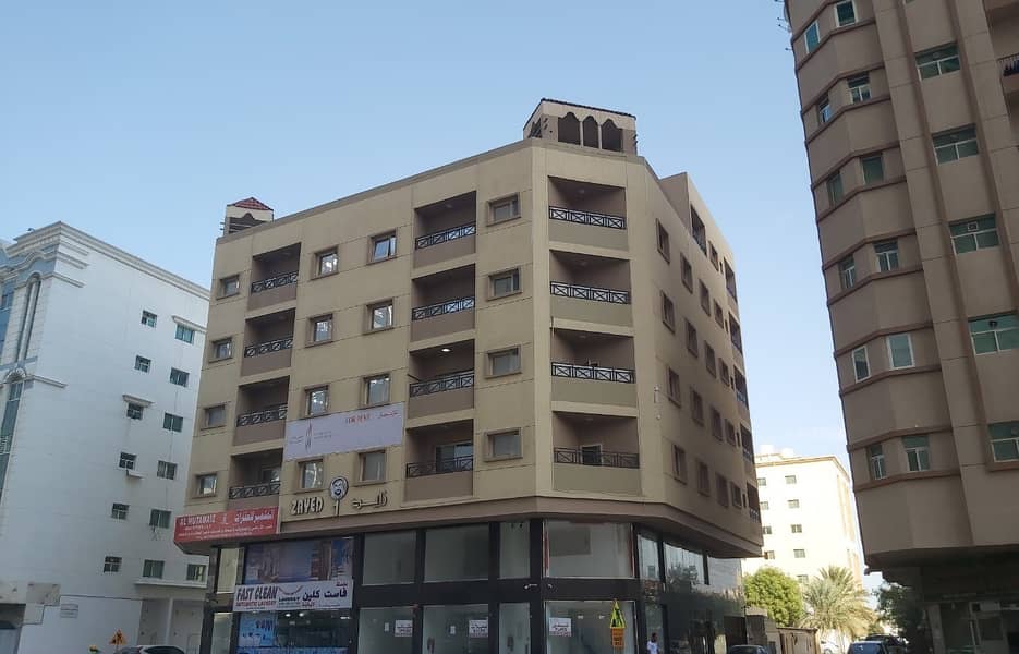 New building for sale in Rashidiya area 6400 feet very special location on the main street and the annual income is attractive